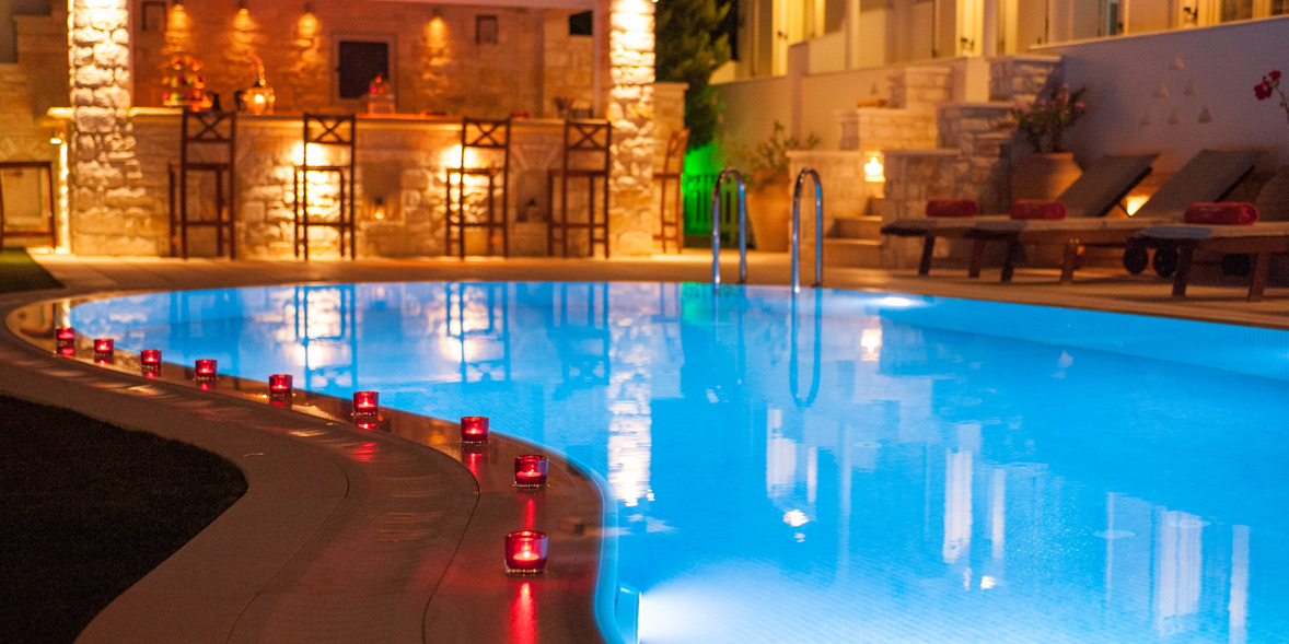The pool bar by night, at Anna Platanou Hotel